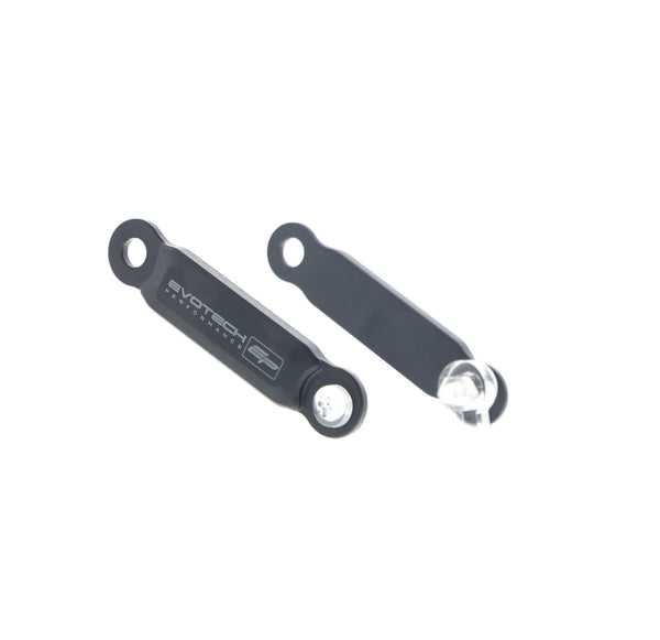 The pair of powder-coated black aluminium brackets of Evotech Pillion Footpeg Removal for the Kawasaki Ninja 650 40th Anniversary Edition also have the Evotech Performance logo displayed on the motorcycle parts.