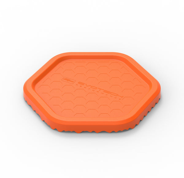 The orange hexagonal Evotech Side Stand Support Puck bears the Evotech Performance logo and with a textured, matt finish for improved grip.