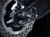 The hourglass shaped paddock stand bobbin from EP Spindle Bobbins Paddock Kit fitted to the rear wheel of the Yamaha FZ-07.