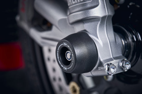 The front fork of the Honda CBR1000RR-R Fireblade SP Carbon Edition with EP Spindle Bobbin Kit crash protection bobbin attached seamlessly.
