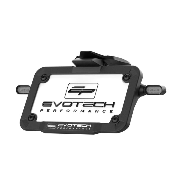 The Evotech Dynamic Tail Tidy with V1 Indicators includes the US-licence plate size bracket and bezel with the addition of Evotech V1 micro LED indicators. The aluminium housed indicators have model-specific wire looms for a plug and play motorcycle accessory.