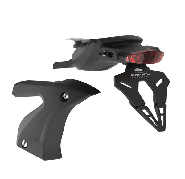 The Evotech Tail Tidy has a replacement red LED light, and aluminium registration display plate and insertion points for the OE motorcycle turn signal indicators. Evotech's bespoke fender eliminator kit also includes a vacuum-formed black swingarm cover.