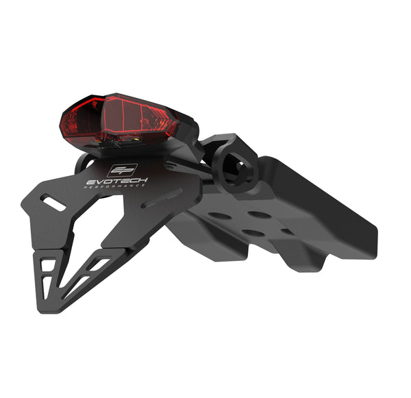 Crafted from aluminium and composite parts, powder-coated black with Evotech Performance logos, the Evotech Tail Tidy has a bespoke fitting to design for the Yamaha adventure motorcycle. EP's fender eliminator has insertion points for the OE turn signals, plus a supplied red rear light with integrated licence plate light.