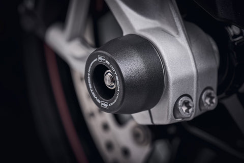 The front wheel of the BMW S1000 RR with EP Spindle Bobbin precisely fitted, offering front fork and brake caliper protection.