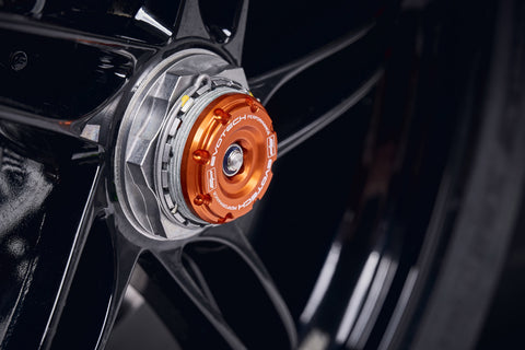 The offside wheel of the KTM 1290 Super Duke R fitted with the anodised orange hub stop of EP Rear Spindle Bobbins crash protection.