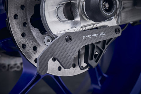 The rear swingarm of the Yamaha MT-10 SP with EP Carbon Fibre Paddock Stand Plates installed, ready to be attached to the paddock stand to elevate the rear wheel.