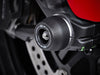 The front wheel of the Ducati Scrambler Full Throttle featuring EP Front Spindle Bobbins crash protection, one half of the EP Spindle Bobbins Paddock Kit. 