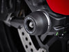 The front wheel of the Ducati Scrambler Icon Dark featuring EP Front Spindle Bobbins crash protection, one half of the EP Spindle Bobbins Paddock Kit. 