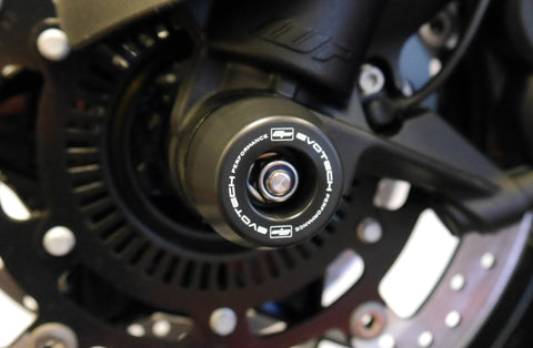 The injection-moulded nylon crash bung of EP Front Spindle Bobbins installed onto the front wheel of the KTM 1290 Super Adventure S, offering strong crash protection to the front forks and brake calipers.