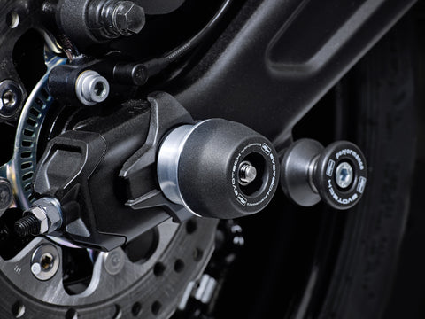 The rear wheel of the Kawasaki Ninja 650 Urban with EP Spindle Bobbins Crash Protection bobbin mounted to the rear spindle offering swingarm protection. 