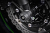 The signature EP Spindle Bobbins Kit precision fitted to the motorcycle, designed to blend with the front forks of the Kawasaki Z900RS.