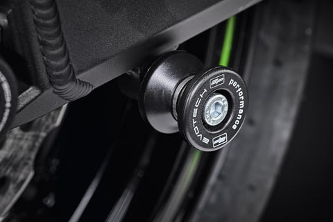 EP Paddock Stand Bobbins inserted into the swingarm of the Kawasaki Z900 Performance.