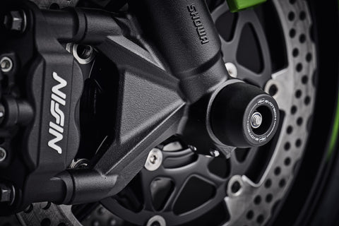 The signature EP Spindle Bobbins Kit precision fitted to the motorcycle, designed to blend with the front forks of the Kawasaki ZX6R.