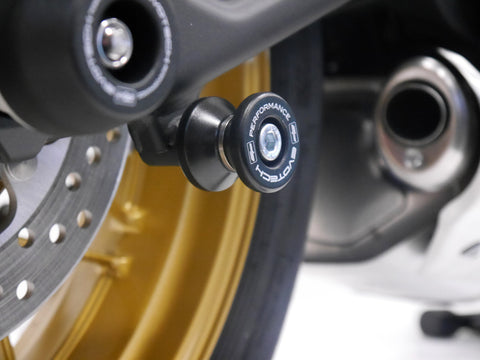 EP Paddock Stand Bobbins inserted into the swingarm of the Kawasaki Z650RS.