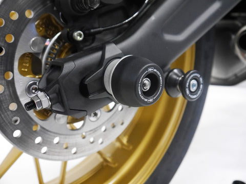 The EP spindle bobbin from EP Spindle Bobbins Kit for the Kawasaki Z650RS is seamlessly attached to the swingarm for crash protection and is fitted near the EP Paddock Stand Bobbins.