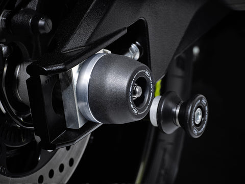The precision fit of the EP bobbin head to the rear wheel of the Suzuki V-Strom 1000 GTA from the EP Spindle Bobbin Kit, offering crash protection the swingarm. 