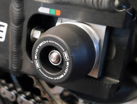 The EP Spindle Bobbin Kit signature bobbin is attached to the rear wheel of the Honda CBR1000RR SP, guarding the swingarm and drive chain.